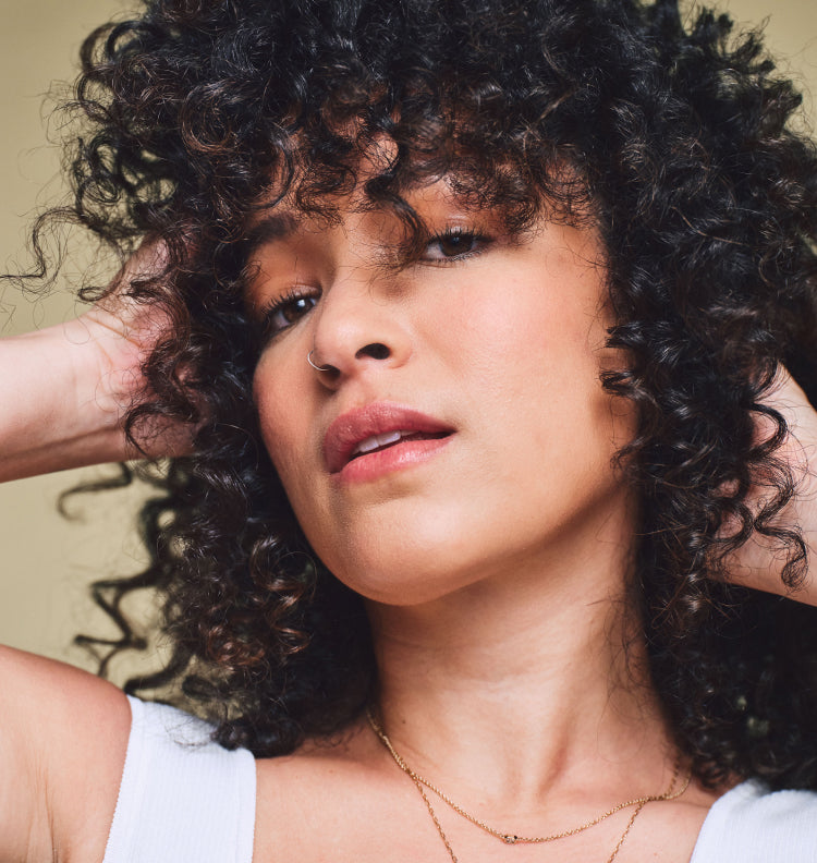 young woman with curly hair