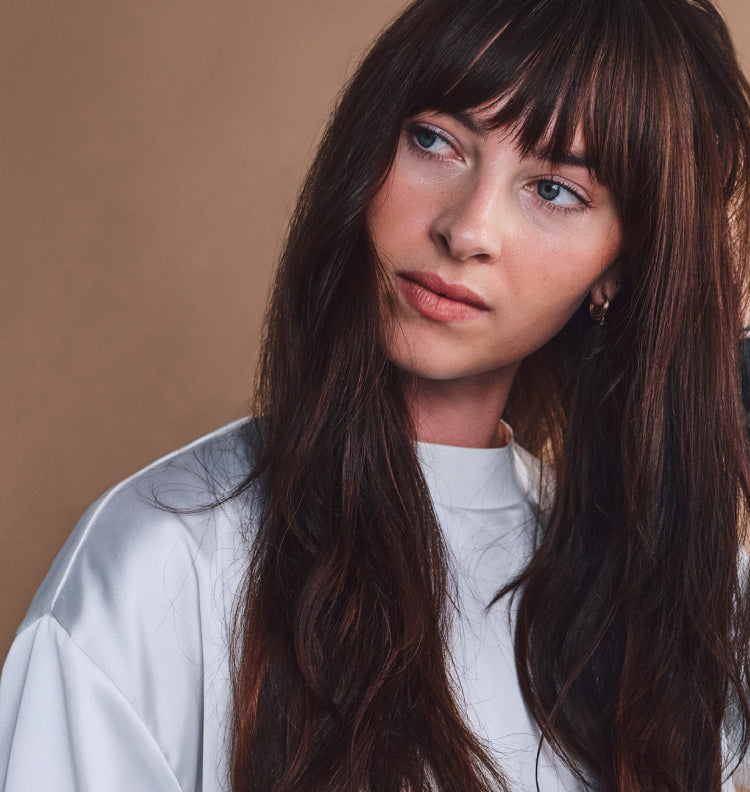 young woman long wavy brown hair