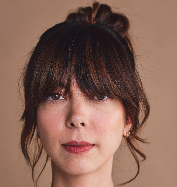 long bangs hair style on young woman