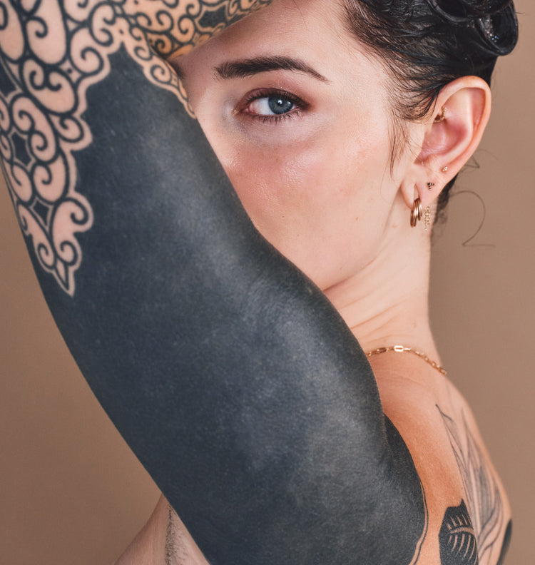 Close up of woman tattoo arm