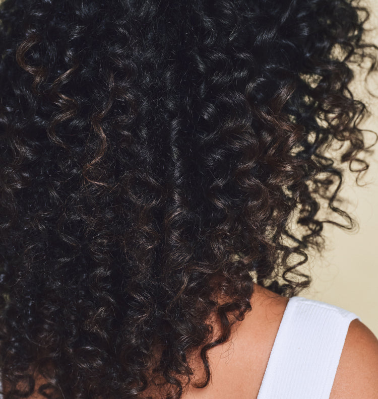 close up of curly dark hair