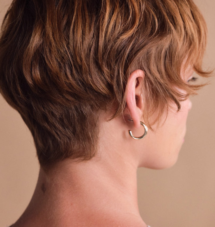 back of woman's head w short hairstyle